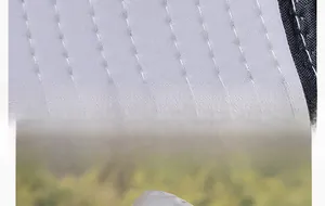 Detail view of precise stitching on breathable grey outdoor wide brim sun hat