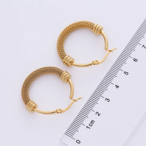 Golden mesh textured hoop earrings measured with a ruler to show the 2.5-3cm diameter size