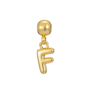 Macro shot of 18k gold plated letter F bubble pendant with a polished metal texture