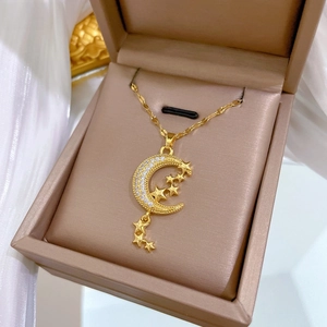 Elegant gold titanium steel necklace featuring moon star pendants and sparkling zircons