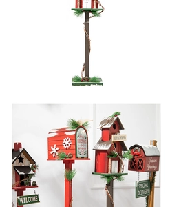 Detailed view of festive wooden Christmas birdhouse mailbox stand with snowy pine accents