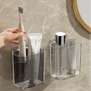 Set of two transparent wall-mounted bathroom organizers with drainage slots for toiletries