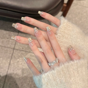 Elegant French champagne glitter press-on nails with white pearls and micro rhinestones