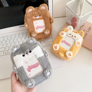 Plush animal-shaped card holders in brown, grey, and orange for ID cards or photos