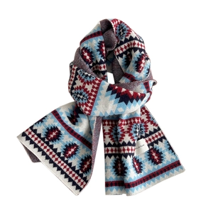 Winter long knitted scarf with red and blue geometric patterns and brand label