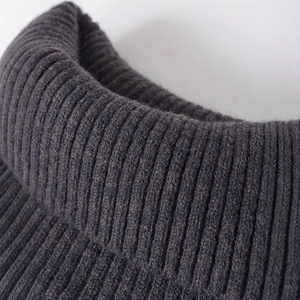 Deep charcoal grey rib-knit short sleeve sweater with a minimalist high neckline