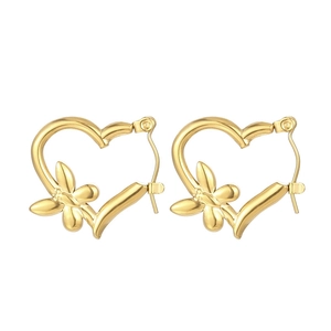 Golden stainless steel heart earrings with dragonfly design on a white background