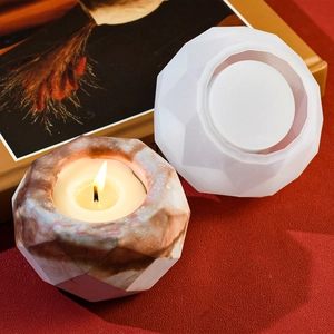 Geometric polyhedral silicone mold and marble-textured DIY candle holder final result