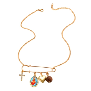 Detail of gold safety pin pendant with religious cross, Maria icon and heart charms