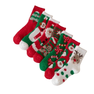 Set of 6 coral fleece Christmas socks with festive patterns like Santa and reindeer
