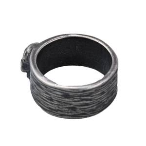 Retro punk skull ring for men in vintage silver finish with detailed carved texture