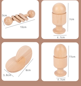 Detailed dimensions of various wooden sensory grasping toys and rattles for infants