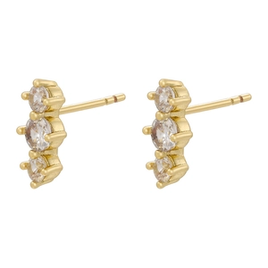 Detailed view of three-stone vertical row cubic zirconia gold-plated stud earrings