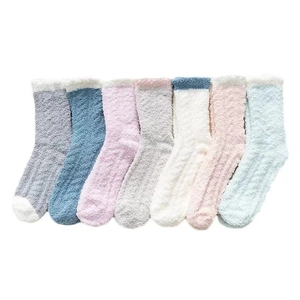 Pack of 7 thick coral fleece winter socks in assorted pastel colors for women