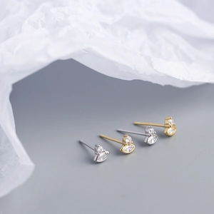 Macro shot of S925 sterling silver marquise eye studs with gold and zircon inlay