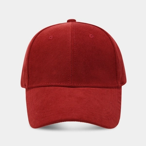 Detail view of burgundy cotton baseball cap with classic six-panel design and ventilation
