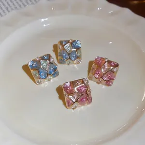 Elegant gold plated rhombus stud earrings with colorful mosaic zircon and starburst glow