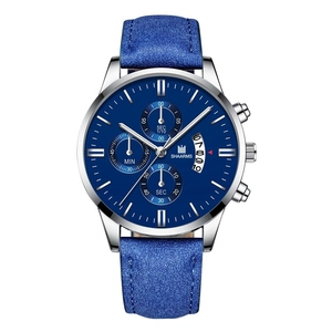 Detail view of the silver case and blue leather strap on this chronograph calendar watch
