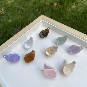 Lot de 9 mini pinces à cheveux en acétate en forme d'ailes avec strass sur herbe