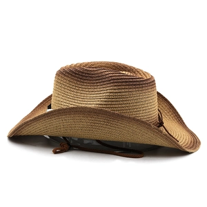 Detail of woven straw cowboy hat with gradient brown finish and adjustable chin strap