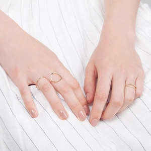 Minimalist gold stainless steel ring set with hollow geometric and woven texture patterns