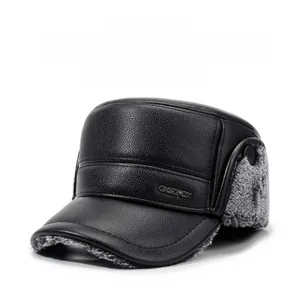 Close-up of black faux leather cap featuring thick grey fleece lining and ear protection