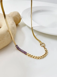 Detailed shot of stainless steel necklace featuring purple zircon stones and OT buckle clasp