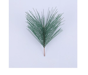 Detail shot of a 135mm artificial pine needle branch with green needles and brown stem