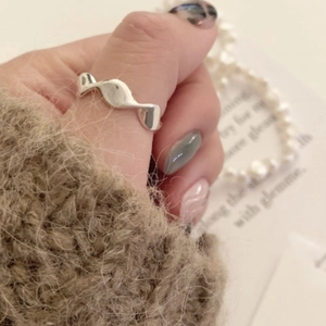Minimalist silver wavy twisted open ring for women with high polished metallic finish