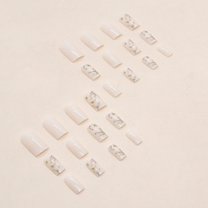 Elegant medium-length square press-on nails with cream base and pink floral patterns