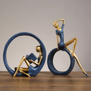 Artistic blue and gold yoga girl reading statues on marble base home decor set