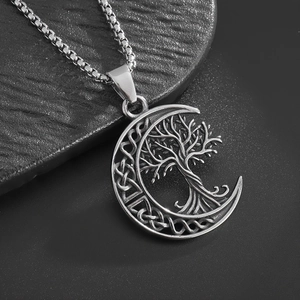 Vintage silver tree of life crescent moon pendant with box chain on dark stone base