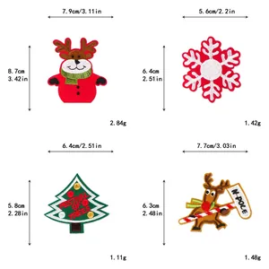 Detailed view of embroidered Christmas patches featuring reindeer and snowflake designs
