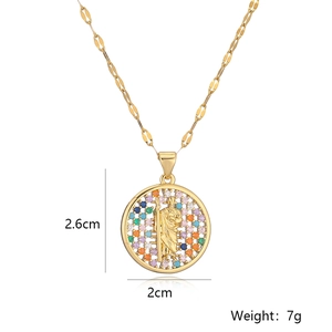 Macro detail of 18K gold plated Mary pendant necklace with dimensions and 7g weight