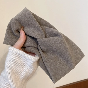 Elegant taupe knitted velvet headband with pleated texture for high cranial top style