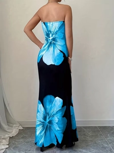Elegant off-shoulder bodycon maxi dress with blue floral print on black fabric