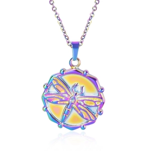 Detail macro view of iridescent dragonfly engraved round pendant necklace in stainless steel