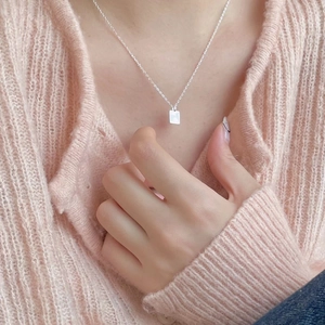 Minimalist 925 sterling silver necklace featuring a tiny polished geometric square pendant
