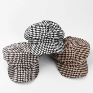Classic houndstooth newsboy caps in three colors for women with a vintage tweed texture