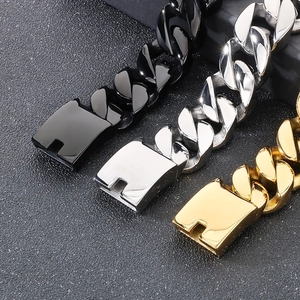 Macro shot of 22mm thick polished Cuban link bracelets in gold, silver, and black finish