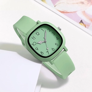 Detailed view of light green square quartz watch with a matching silicone strap for daily use
