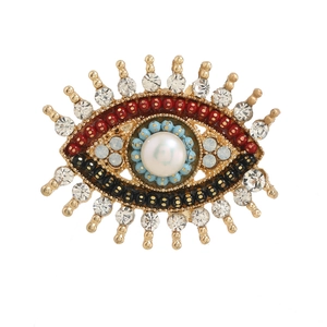 Vintage gold evil eye brooch with freshwater pearls and sparkling colorful rhinestones