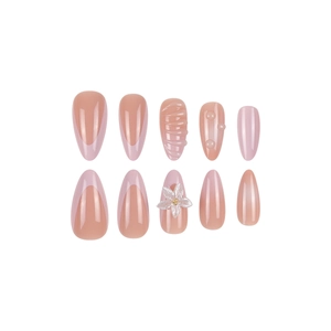 French almond press-on nails with 3D floral designs and water drop accents in nude pink