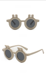 Detailed front and side views of brown rabbit ear sunglasses with grey lenses for kids