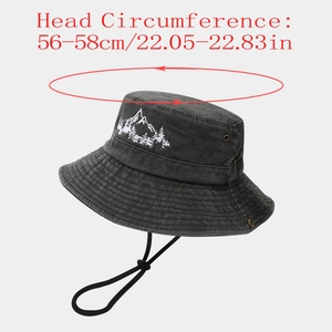 Detail of outdoor hiking hat showing mountain embroidery and 56-58cm head measurement