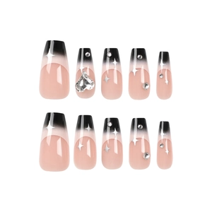 Gradient coffin press-on nails in black and pink with rhinestones and heart charms