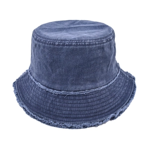 Detail of frayed edges and washed denim texture on this vintage dark blue bucket hat