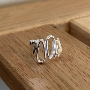 Minimalist 925 sterling silver multi-layer irregular droplet open ring on wood background