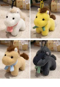 Detail of cute plush pony keychains in white, yellow, brown, and dark grey colors