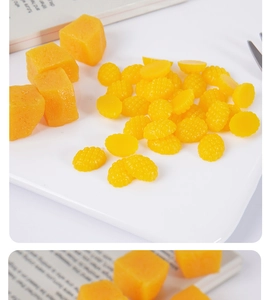 Detailed macro view of 1.5cm resin mango cubes for DIY miniature food craft projects